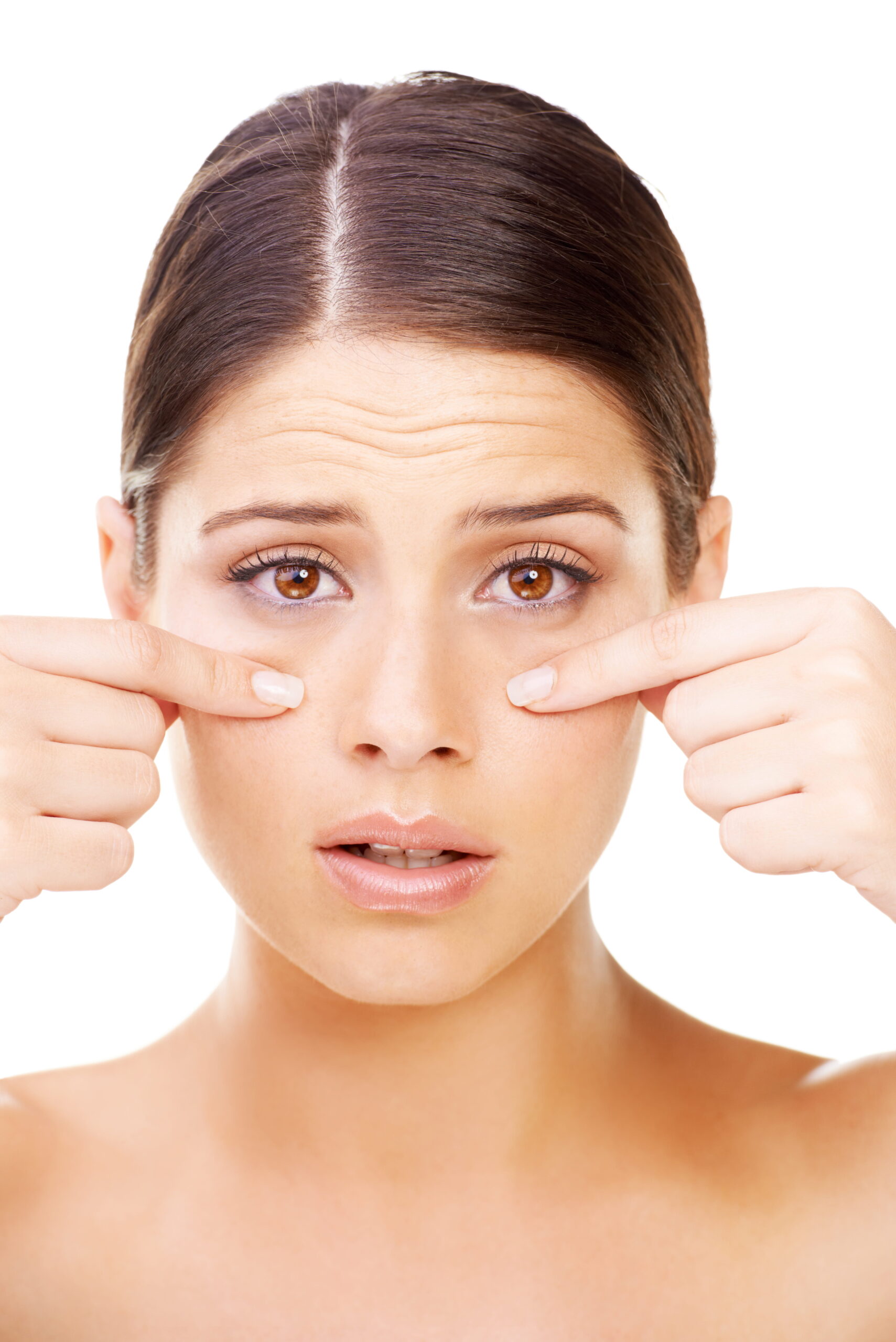 Woman pointing on her eyes.