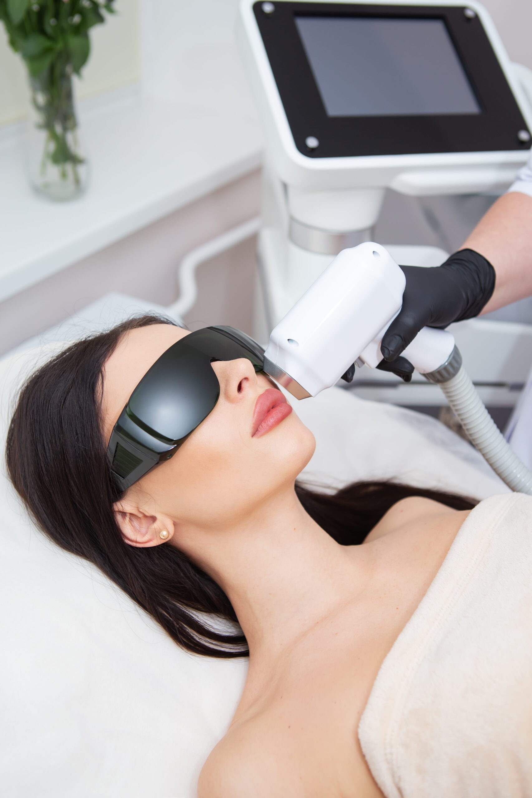The process of laser hair removal of the female body.