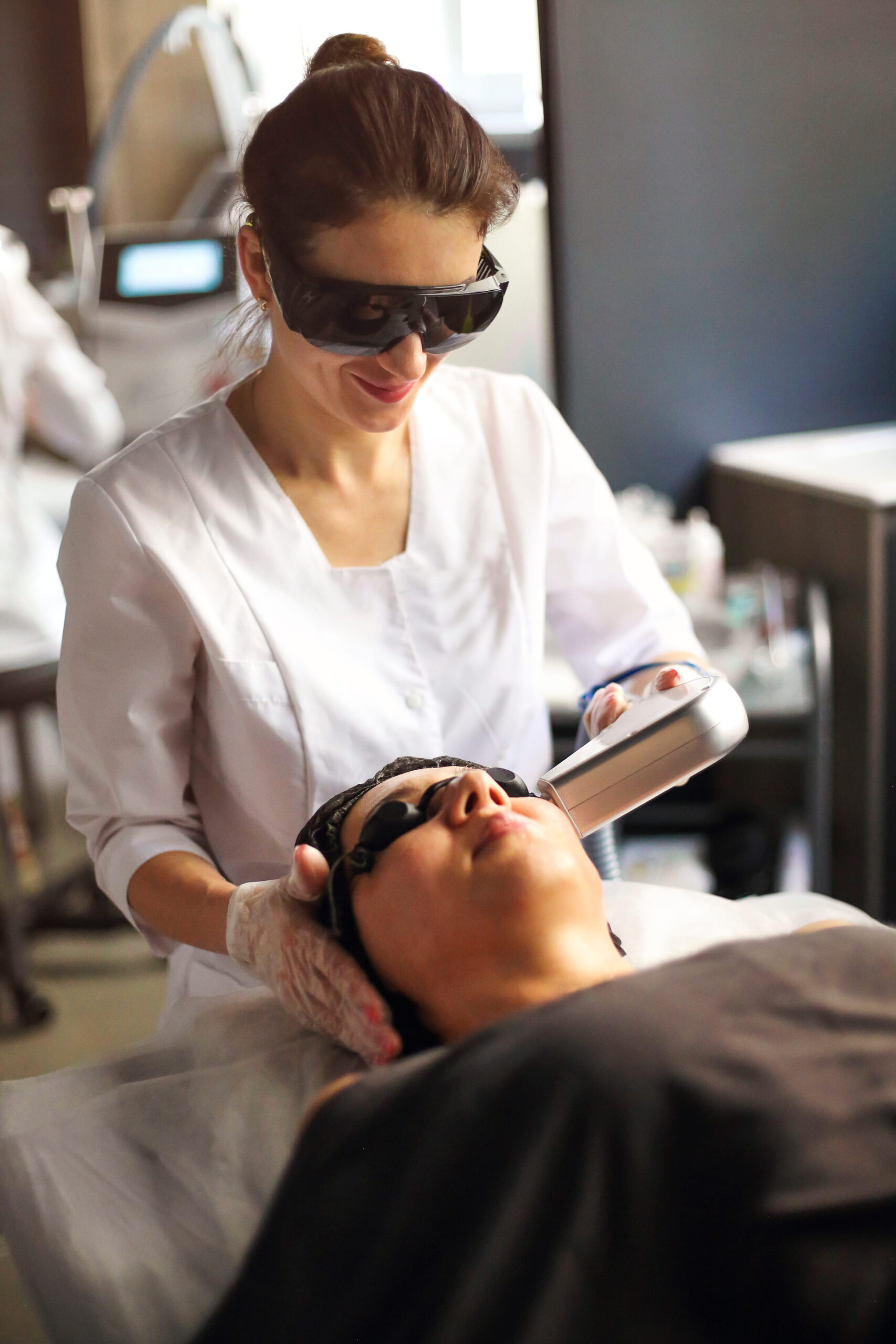 Woman Receiving Gentle Facial Treatment at Spa