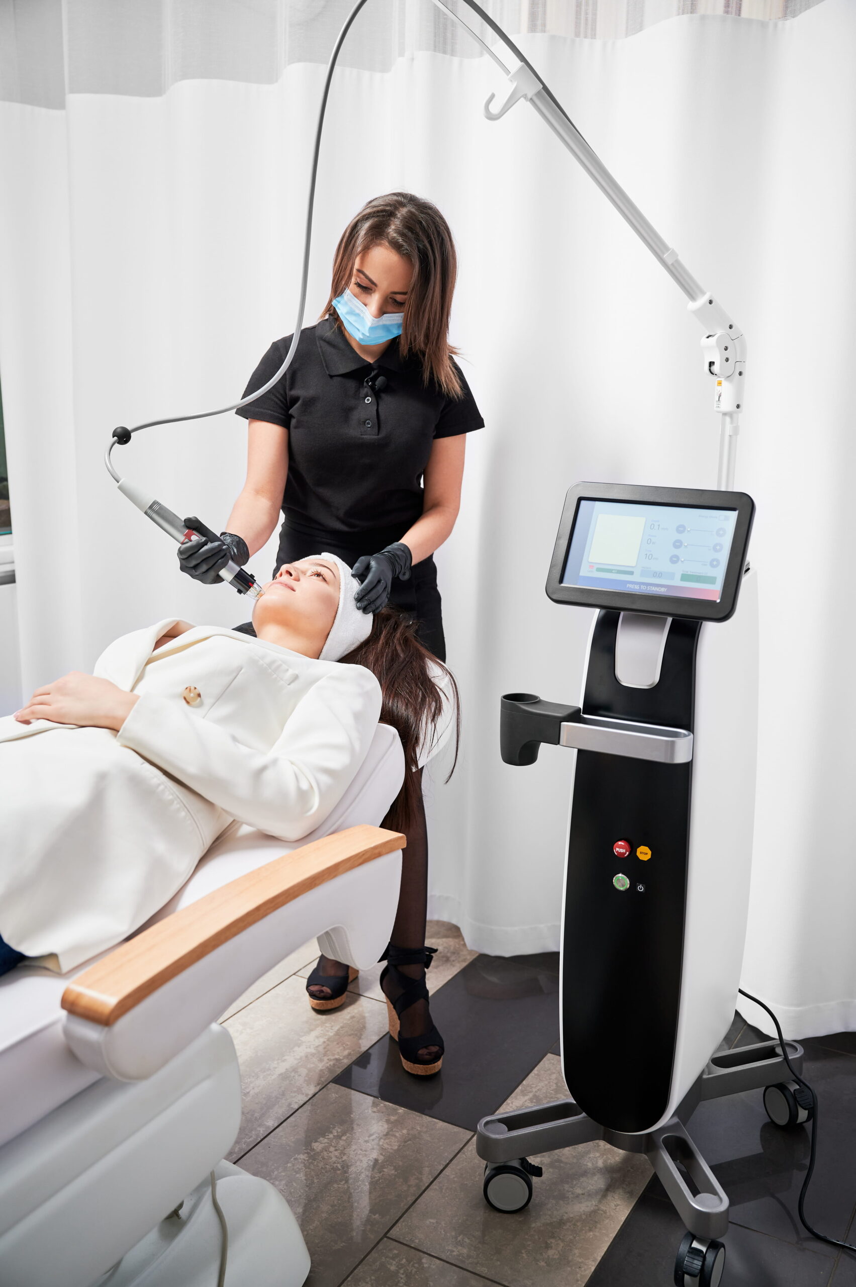 Woman Receives a Medical Spa Laser Treatment.
