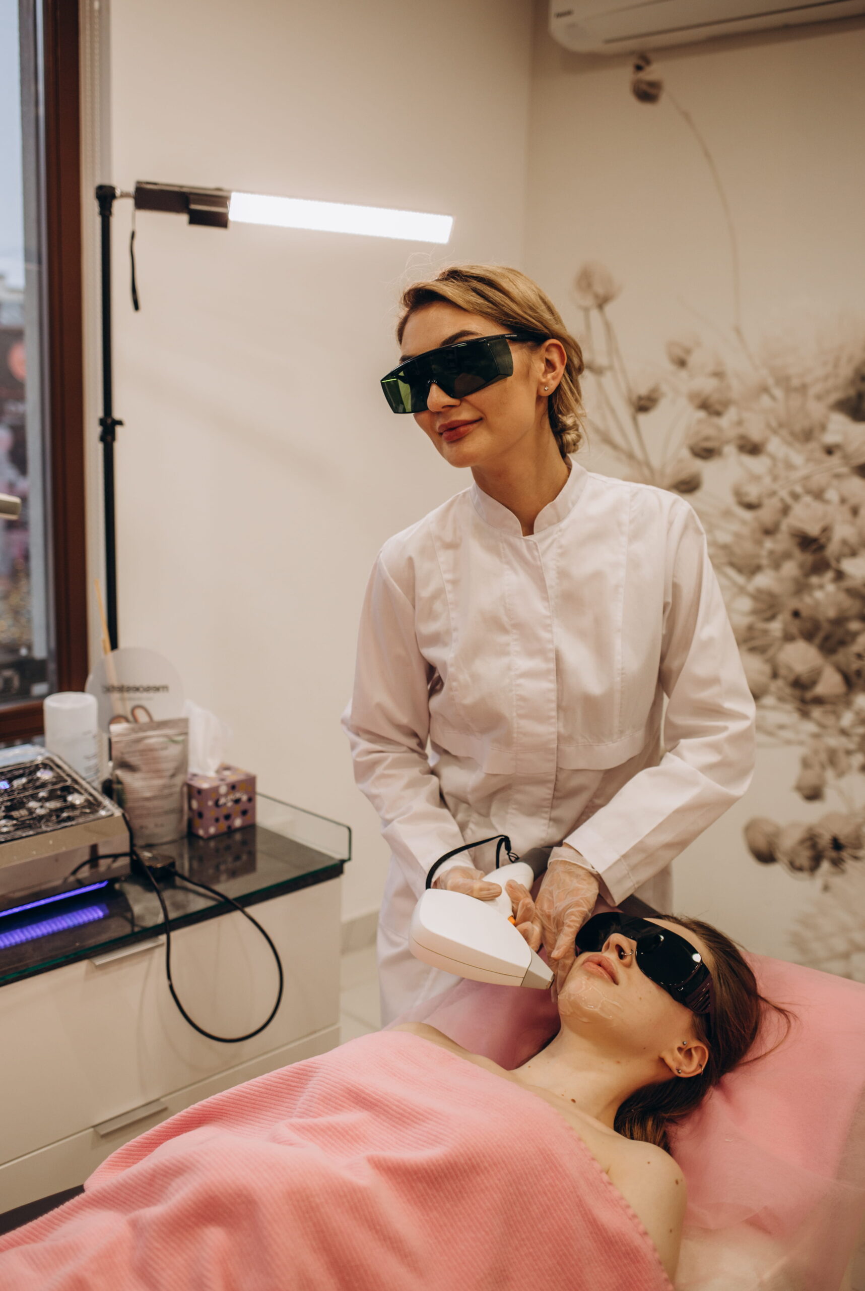 Woman Receives Facial Treatment in Beauty Clinic